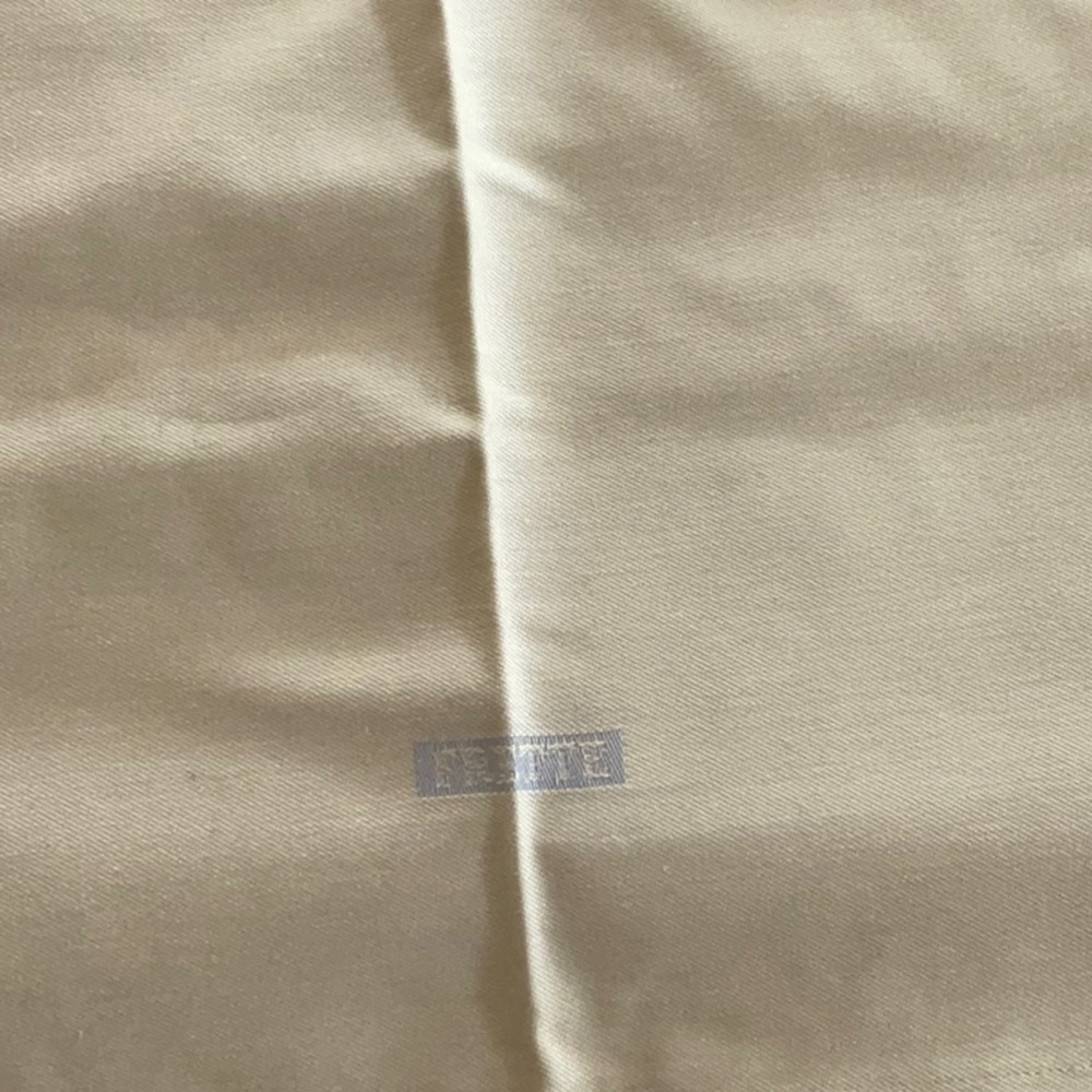 NEW FRETTE SET OF FOUR NAPKINS COLOR IS LIKE A FLAX WITH GREY/SILVER OTHER SIDE